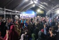 Suasana kemeriahan kampanye Paslon 2 dokter Ulfah-MHG di Kelurahan Bojo Baru, Kecamatan Mallusettasi, Rabu (23/10/2024) malam.