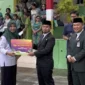 Wali Kota Parepare, Tasming Hamid bertindak sebagai pembina upacara dalam peringatan Hari Amal Bhakti (HAB) ke-80 Kementerian Agama Republik Indonesia tingkat Kota Parepare di halaman Kantor Kementerian Agama Kota Parepare di Jl Jendral Sudirman, Kelurahan Cappa Galung, Kecamatan Bacukiki Barat, Kota Parepare, Sulsel, Jumat (3/1/2026). (Foto: ist).